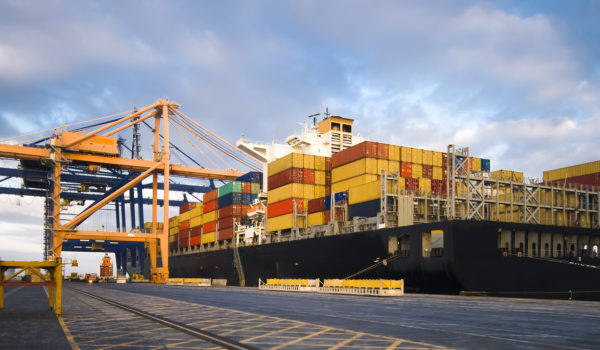Vessel in port with gantry cranes